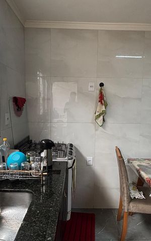 Casa à venda com 100m², 2 quartos e 2 vagas Casa à venda com 100m², 2 quartos e 2 vagasCozinha