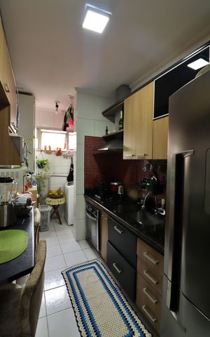 Apartamento à venda com 60m², 2 quartos e 1 vagaCozinha e Área de Serviço