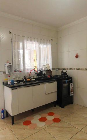 Casa à venda com 85m², 2 quartos e 2 vagas Casa à venda com 85m², 2 quartos e 2 vagasCozinha