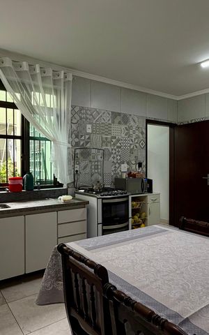 Casa à venda com 150m², 3 quartos e 3 vagas Casa à venda com 150m², 3 quartos e 3 vagasCozinha 3