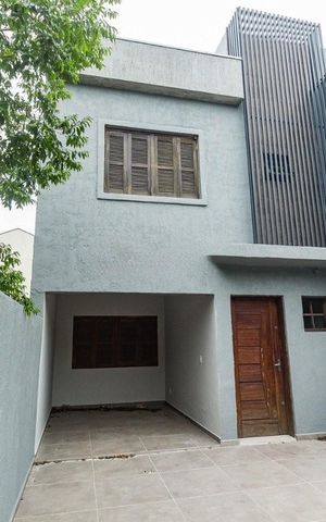 Casa à venda com 120m², 3 quartos e 1 vaga Casa à venda com 120m², 3 quartos e 1 vagaFachada
