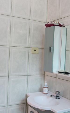 Casa à venda com 156m², 3 quartos e 3 vagasBanheiro