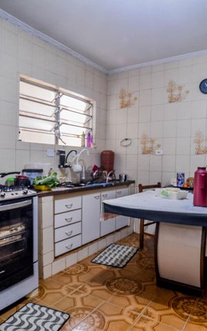 Casa à venda com 157m², 3 quartos e 2 vagas Casa à venda com 157m², 3 quartos e 2 vagasCozinha