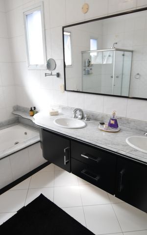 Casa à venda com 394m², 3 quartos e 4 vagasBanheiro Suíte