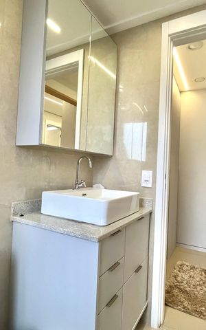 Apartamento à venda com 106m², 2 quartos e 2 vagas Apartamento à venda com 106m², 2 quartos e 2 vagasBanheiro 1 da Suits 1