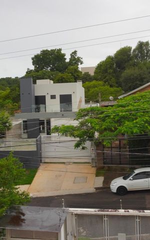 Casa à venda com 310m², 3 quartos e 3 vagas Casa à venda com 310m², 3 quartos e 3 vagasVista da Rua