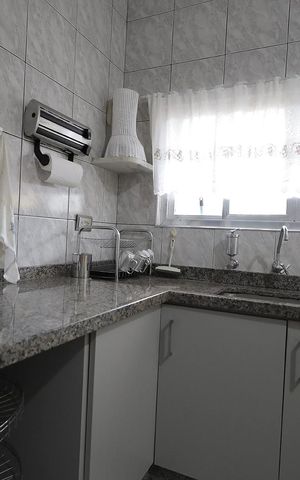 Casa à venda com 187m², 4 quartos e 2 vagas Casa à venda com 187m², 4 quartos e 2 vagasCozinha