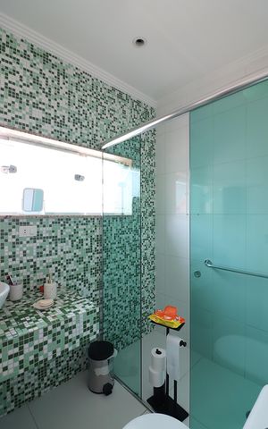 Casa à venda com 350m², 4 quartos e 8 vagasSuíte 3 Banheiro 