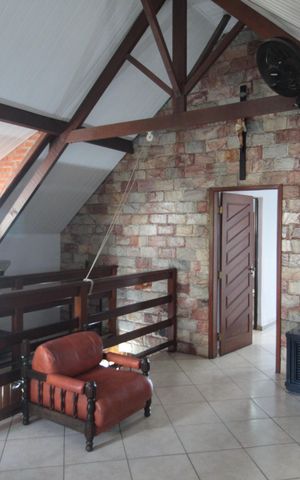 Casa à venda com 360m², 5 quartos e 2 vagasSala de TV