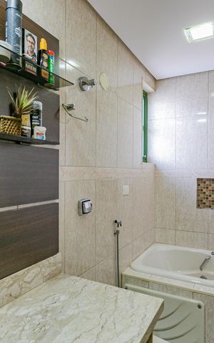 Casa à venda com 280m², 3 quartos e 2 vagas Casa à venda com 280m², 3 quartos e 2 vagasBanheiro da Suíte
