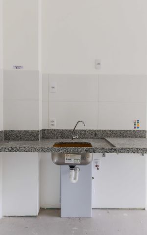 Studio à venda com 32m², 1 quarto e sem vaga Studio à venda com 32m², 1 quarto e sem vagaSala / Cozinha