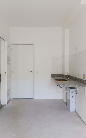 Studio à venda com 32m², 1 quarto e sem vaga Studio à venda com 32m², 1 quarto e sem vagaSala / Cozinha