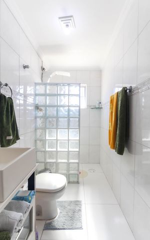 Casa à venda com 205m², 4 quartos e 2 vagasBanheiro Social Casa 1