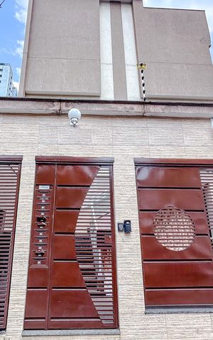 Casa de condomínio à venda com 116m², 2 quartos e 2 vagasFachada com Plaquinha