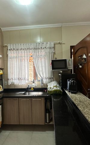 Casa à venda com 210m², 2 quartos e 2 vagas Casa à venda com 210m², 2 quartos e 2 vagasCozinha