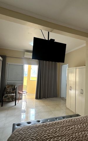 Casa à venda com 210m², 2 quartos e 2 vagas Casa à venda com 210m², 2 quartos e 2 vagasSuíte