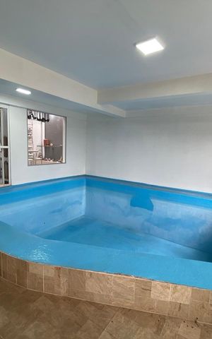 Casa à venda com 420m², 4 quartos e 2 vagas