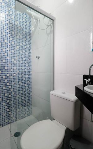 Casa à venda com 100m², 2 quartos e 2 vagasSuíte 2