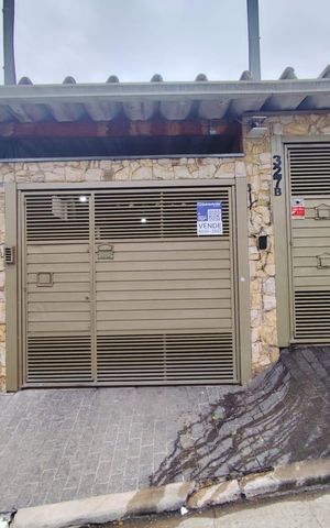 Casa à venda com 100m², 2 quartos e 2 vagas Casa à venda com 100m², 2 quartos e 2 vagasFachada