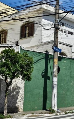 Casa à venda com 304m², 5 quartos e 2 vagas Casa à venda com 304m², 5 quartos e 2 vagasFachada