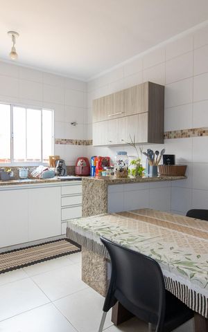 Casa à venda com 96m², 2 quartos e 3 vagas Casa à venda com 96m², 2 quartos e 3 vagasCozinha