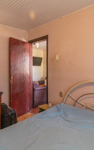 Casa à venda com 70m², 2 quartos e 2 vagasQuarto 1