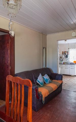 Casa à venda com 70m², 2 quartos e 2 vagasSala
