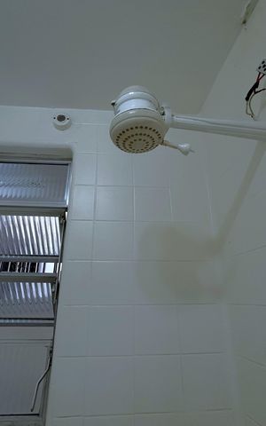 Apartamento à venda com 55m², 2 quartos e sem vagaChuveiro