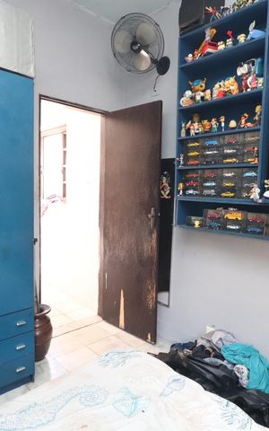 Casa à venda com 80m², 2 quartos e 2 vagasQuarto 1