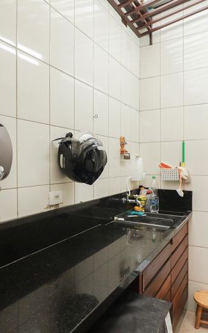 Casa à venda com 85m², 2 quartos e 2 vagas Casa à venda com 85m², 2 quartos e 2 vagasCozinha e Área de Serviço