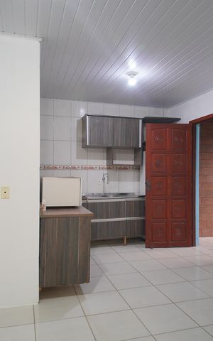 Casa à venda com 80m², 2 quartos e 1 vagaSala/Cozinha 2