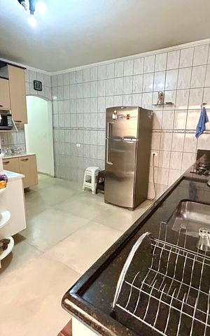 Casa à venda com 260m², 3 quartos e 2 vagas Casa à venda com 260m², 3 quartos e 2 vagasCozinha