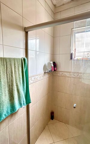 Casa à venda com 260m², 3 quartos e 2 vagas Casa à venda com 260m², 3 quartos e 2 vagasBanheiro da Suíte