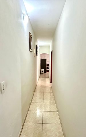 Casa à venda com 260m², 3 quartos e 2 vagas Casa à venda com 260m², 3 quartos e 2 vagasCorredor
