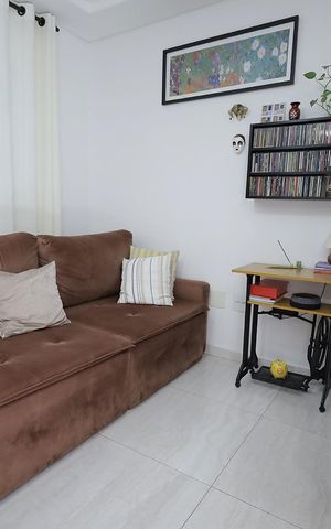 Casa à venda com 117m², 2 quartos e 2 vagas Casa à venda com 117m², 2 quartos e 2 vagasSala