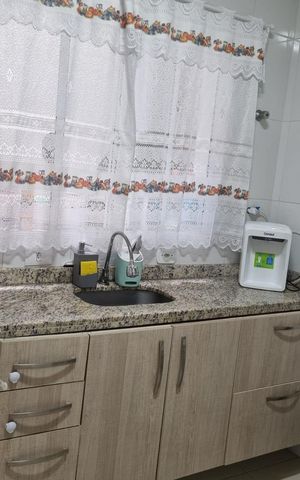 Casa de condomínio à venda com 57m², 2 quartos e 1 vaga Casa de condomínio à venda com 57m², 2 quartos e 1 vagaCozinha
