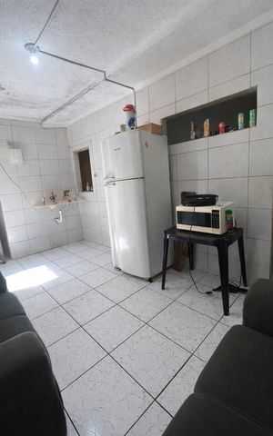 Casa à venda com 220m², 4 quartos e 2 vagas Casa à venda com 220m², 4 quartos e 2 vagasCozinha
