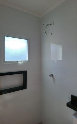 Casa à venda com 160m², 3 quartos e 2 vagas Casa à venda com 160m², 3 quartos e 2 vagasBanheiro da Suíte 03
