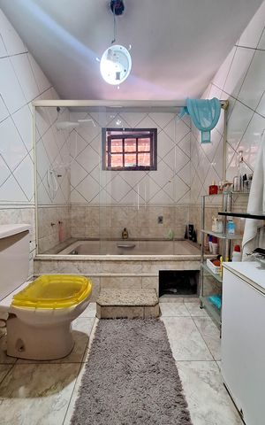 Casa à venda com 400m², 4 quartos e 1 vaga Casa à venda com 400m², 4 quartos e 1 vagaBanheiro da Suíte 1