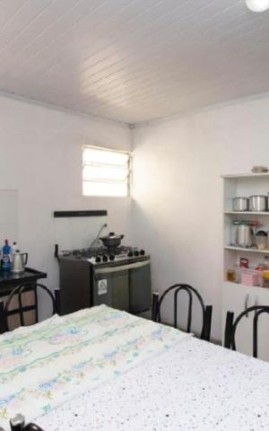 Casa à venda com 140m², 4 quartos e 2 vagas Casa à venda com 140m², 4 quartos e 2 vagasCozinha