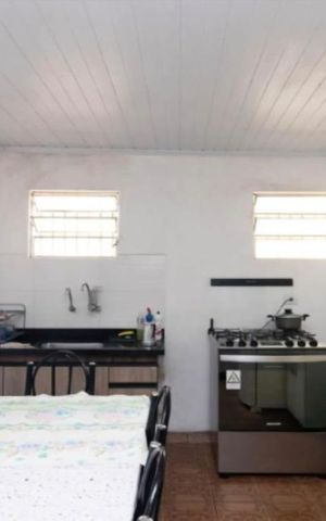Casa à venda com 140m², 4 quartos e 2 vagas Casa à venda com 140m², 4 quartos e 2 vagasCozinha