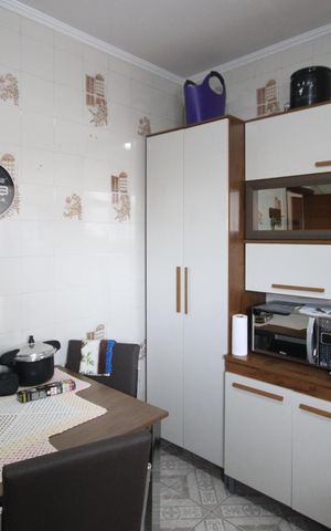 Casa à venda com 125m², 4 quartos e 2 vagas Casa à venda com 125m², 4 quartos e 2 vagasCozinha