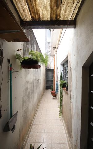Casa à venda com 125m², 4 quartos e 2 vagas Casa à venda com 125m², 4 quartos e 2 vagasCorredor