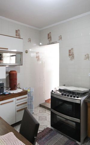 Casa à venda com 125m², 4 quartos e 2 vagas Casa à venda com 125m², 4 quartos e 2 vagasCozinha