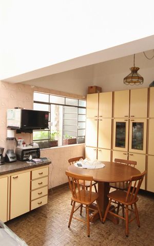 Casa à venda com 125m², 4 quartos e 2 vagas Casa à venda com 125m², 4 quartos e 2 vagasCozinha