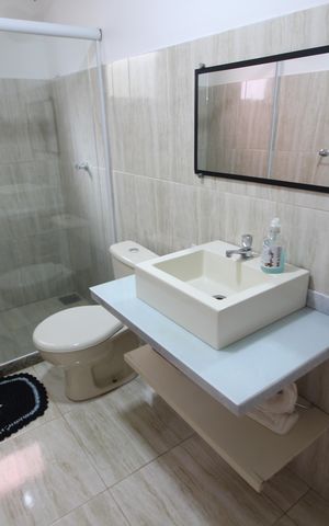 Casa de condomínio à venda com 600m², 4 quartos e 3 vagasBanheiro Social - Área Externa