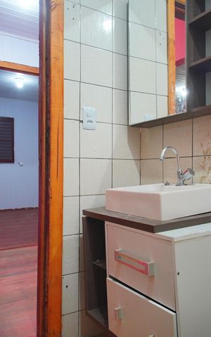 Casa à venda com 96m², 2 quartos e 1 vagaBanheiro