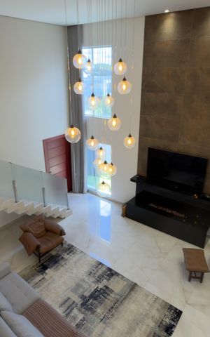 Casa de condomínio para alugar com 453m², 4 quartos e 3 vagas