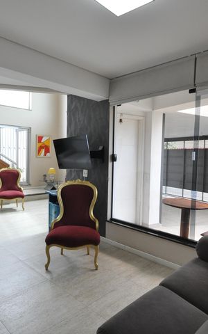 Casa à venda com 353m², 3 quartos e 3 vagasSala