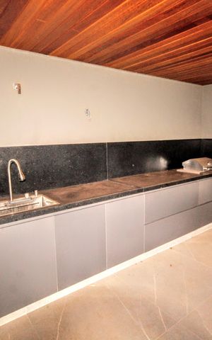 Casa de condomínio à venda com 403m², 4 quartos e 4 vagasÁrea gourmet